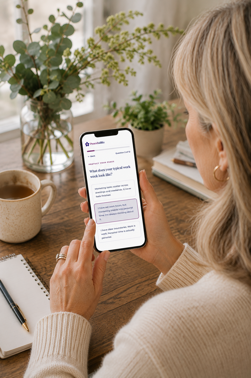A woman taking the Peaceful Marketing Quiz on her phone